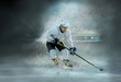 © Andrii IURLOV - Caucassian ice hockey Players in dynamic action in a professiona