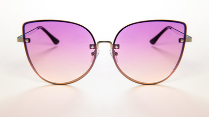 Pink Stylish sunglasses metallic frame on white background. summer is coming concept.