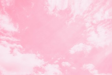 Wall Mural - Light delicate pink sky background. Beautiful romantic sky with white clouds.Copy space, toned photo