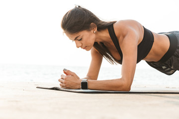 Poster - Healthy fit sportswoman doing exercises