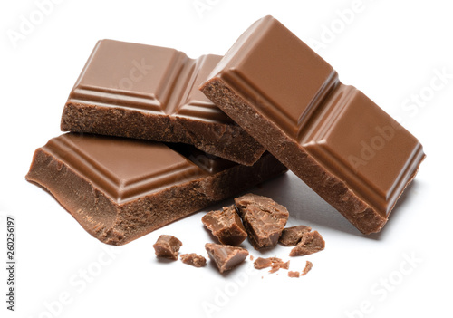 Cuadros en Lienzo Milk organic chocolate pieces isolated on white background