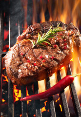 Wall Mural - Beef steak sizzling on the grill