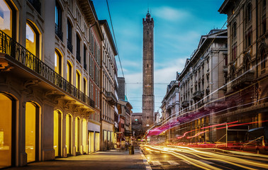 two famous falling bologna towers asinelli and garisenda. evening view. bologna, emilia-romagna, ita