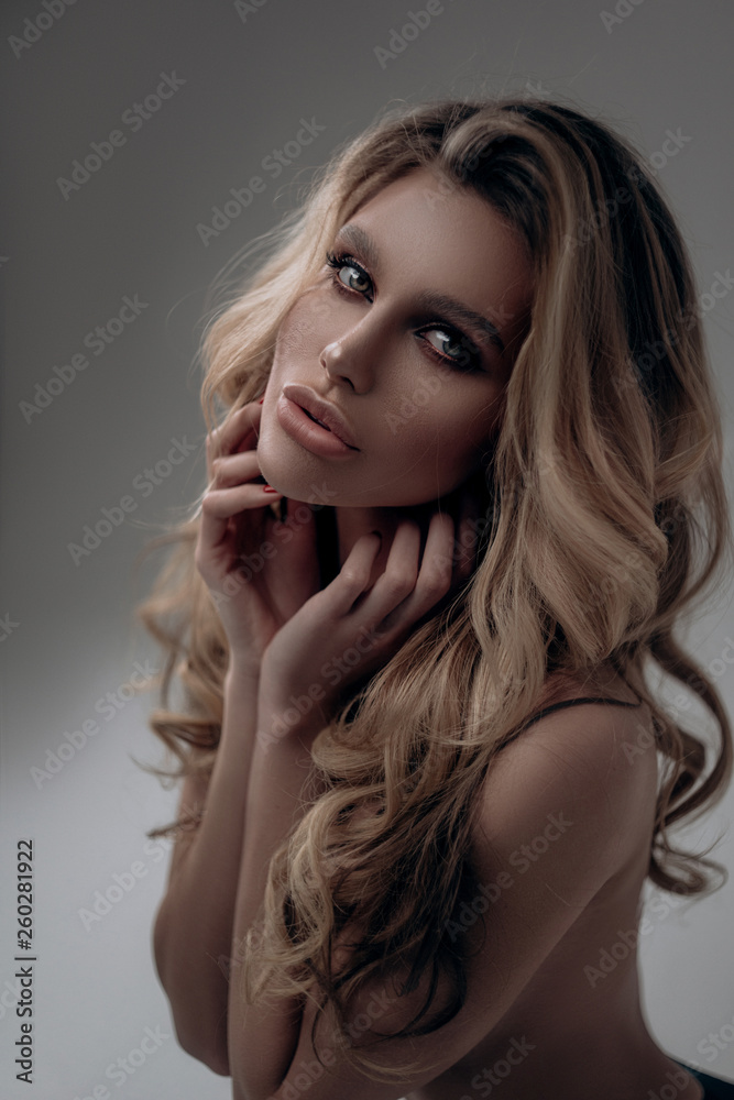 Beautiful Sexy Blonde Girl Posing Topless In A Studio In Black 