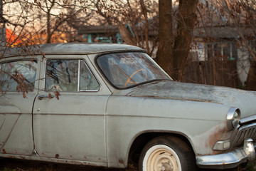 Photo of one old car in the village