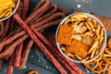 Assortment of beer snacks close up on counter