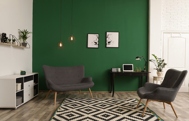 Sticker - Modern living room interior with workplace near green wall