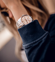 Wall Mural - Stylish trendy watch on woman hand