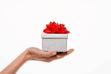 gift in hand isolated on white background