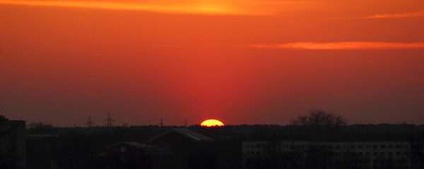 Wall Mural - Panoramic beautiful sunset on the outskirts of the city