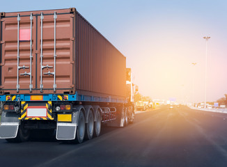 Truck on highway road with red container, transportation concept.,import,export logistic industrial Transporting Land transport on the asphalt expressway with blue sky