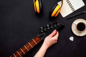 Music record studio with musician and DJ instruments black background top view copyspace