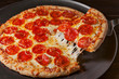 © lindahughes - Pepperoni PIzza with Cheese Pull