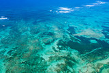 Fototapeta Do akwarium - Aerial view from drone on Atlantic ocean with reef and waves