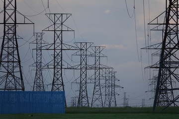 electricity pylons at sunset