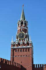 Clock tower of the Moscow Kremlin against the blue sky