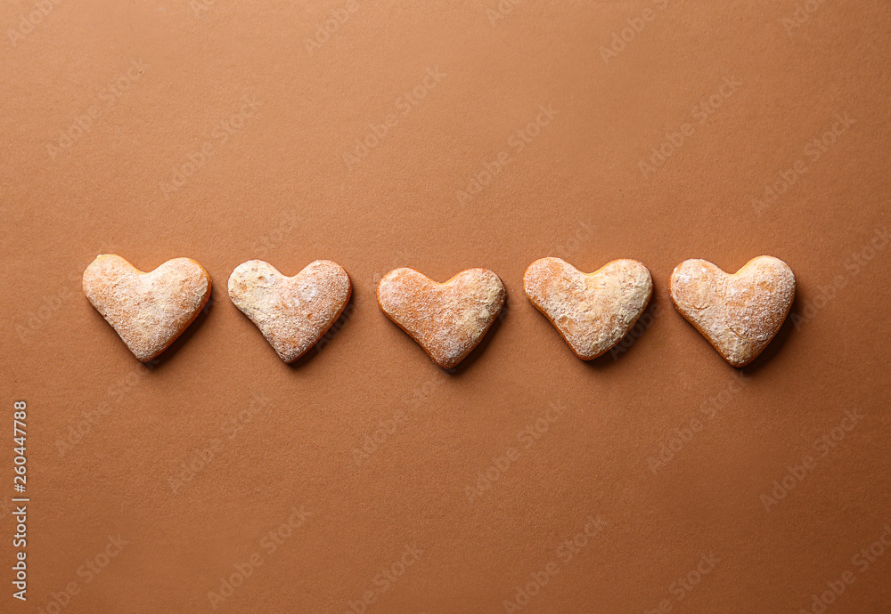 Tasty cookies on color background