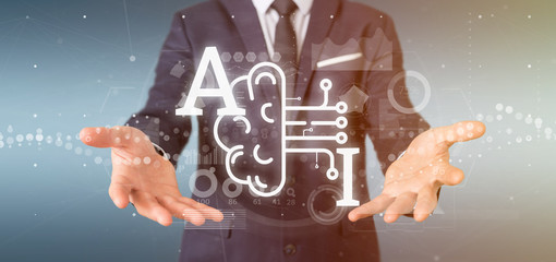 Poster - Business man holding artificial intelligence icon with half brain and half circuit 3d rendering