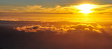 Fototapeta Krajobraz - Golden sunset above clouds, mountain view, Table Mountain, South Africa