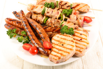 Canvas Print - assorted barbecue meat with sausage, pork chop and beef skewer