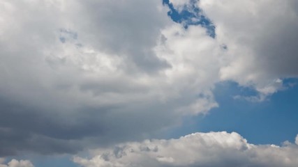 Wall Mural - partially cloudy. the movement of cumulus clouds in the spring sky. timelapse. beautiful natural sky