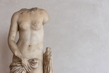 Ancient roman statue in ruins showing a nude female body