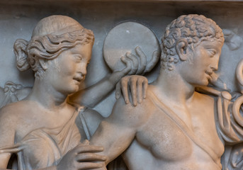 Young couple sculpted on marble