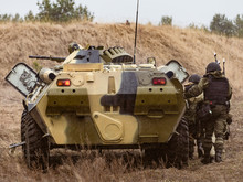 Russian Counter-terrorist Unit Under The Cover Of Armored Vehicles