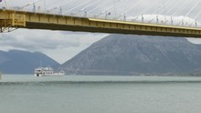 Rio-Antirrio Bridge Connecting Peloponnese With Greece Mainland. Ferryboat Crossing The Canal.
