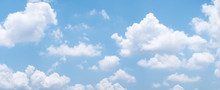 Blue Sky Background With White Clouds During Day . Panorama .