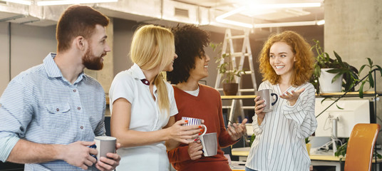 Happy millennial team during break time in office