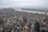 Fototapeta Londyn - Aerial view of Manhattan in New York City showing the classic high rise buildings and city scape in the USA