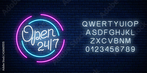Cuadros en Lienzo Neon open 24 hours 7 days sign in circle shape with alphabet