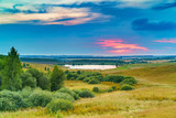Fototapeta Na ścianę - Beautiful sunset over lake in a countryside