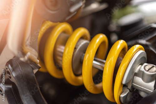 Cuadros en Lienzo Closeup of springs, yellow shock absorbers motorcycle big bike, selective focus
