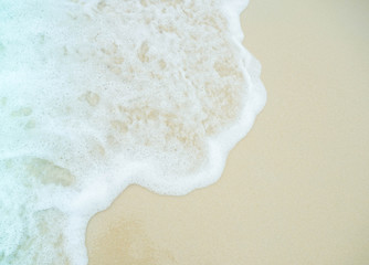  Sea water wave and water foam on beach background