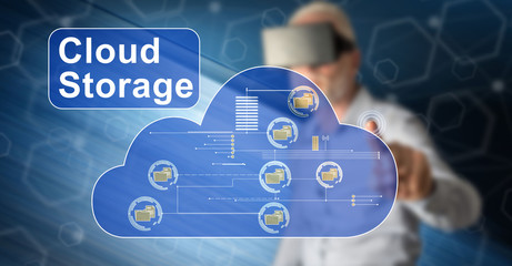 Wall Mural - man touching a cloud storage concept