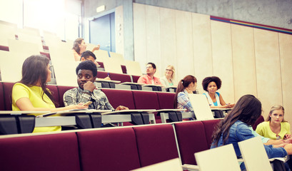 education, high school, university, learning and people concept - group of international students wi