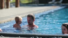 Father And Son, Playing In The Pool, Dad Learning Baby To Swin, Going Underwater, Splashing And Playing