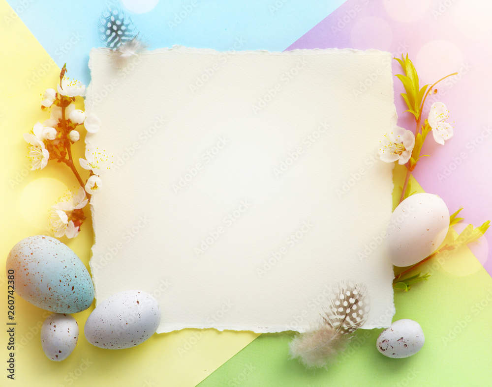 Easter background; Easter Eggs with spring Flowers on colorful Background - obrazy, fototapety, plakaty 
