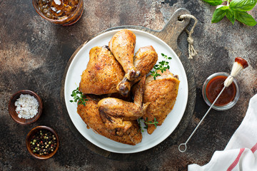 Wall Mural - Roasted or smoked whole carved chicken on a plate