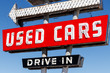 © jetcityimage - Used Car Drive In neon sign from the 50s at a pre owned car dealership I