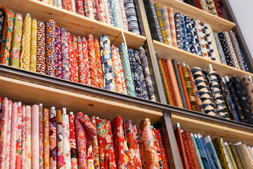 Cloth rolls on store shelves