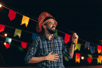 Brazilian man wearing traditional clothes for Festa Junina - June festival