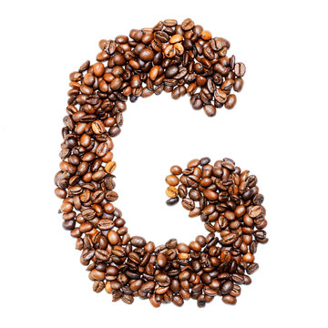 Coffee alphabet letter isolated on white background, closed up, letter G