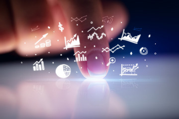 Finger touching tablet with business reports and charts concept
