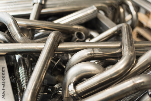 Fotomural Background of metal twisted pipes