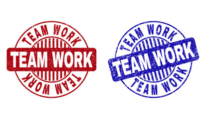 Grunge TEAM WORK round stamp seals isolated on a white background. Round seals with grunge texture in red and blue colors. Vector rubber watermark of TEAM WORK title inside circle form with stripes.