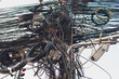 canvas print picture - Crazy messy chaos wires cables on Electric poles.