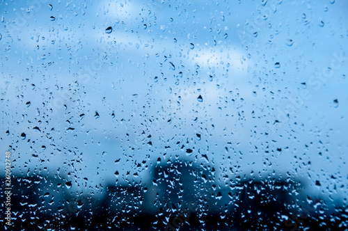 Photographie blue Texture Raindrops on window glass for rain, photo, blurred background, driz